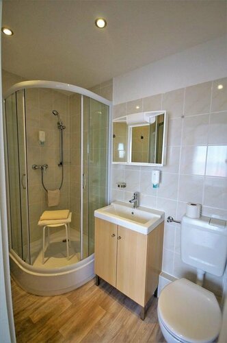 Hotel Am Kurpark, Забронировать Отель Бад-Зудерод земля Саксония-Анхальт