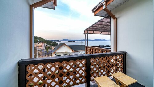 Yeosu Dulggot Pension, Забронировать Гостевой дом Отели Йосу с парковкой, Парковка
