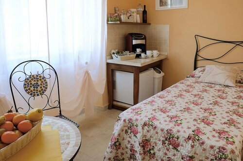 Casa I Gerani Vista Mare, Забронировать Отель «постель и завтрак» Альгеро Sardinia North