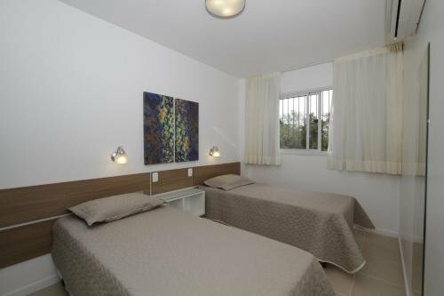 Residencial Jardim dos Beija- Flores, Забронировать Отель Бомбиньяс Санта-Катарина