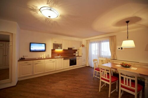 Aparthotel Dachsteinblick, Забронировать Апарт-отель Флахау Salzburger Sportwelt