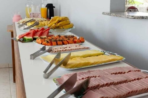 La Ferrugem Suites - 100 mts da Praia, Забронировать Отель Гаропаба Санта-Катарина