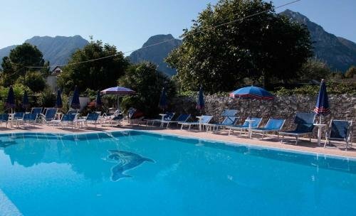 Hotel Villa Claudia, Забронировать Отель Торболе Alto Garda e Ledro