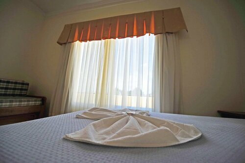 Capão Praia Hotel, Забронировать Отель Капан-да-Каноа Риу-Гранди-ду-Сул