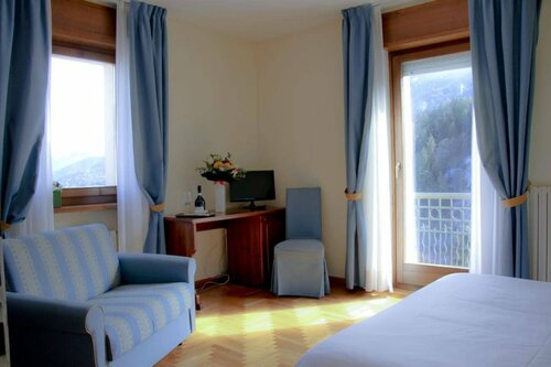 Hotel Belvedere Dolomiti, Забронировать Отель Отели в центре Пьеве-ди-Кадоре, в центре
