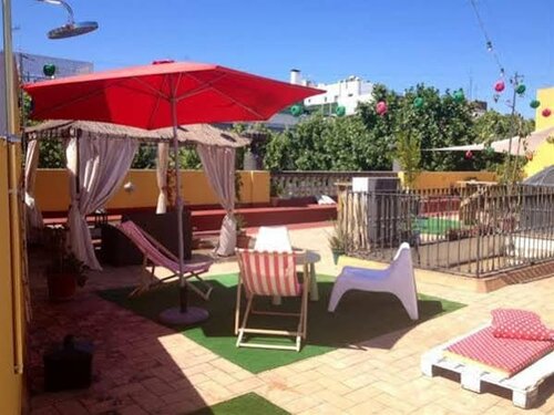La Flamenka Hostel, Забронировать Хостел Недорогие отели Севильи, рядом с Edificio Expo, недорогие