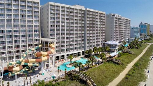 Crown Reef Beach Resort and Waterpark, Забронировать Курортный отель Миртл-Бич Гранд-Странд, рядом с Музей искусств пляжа Миртл