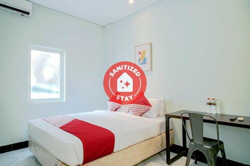 Sayang Home Stay by OYO Rooms, Book Hotel Hoteller i Sulawesi med parkering, Parkering