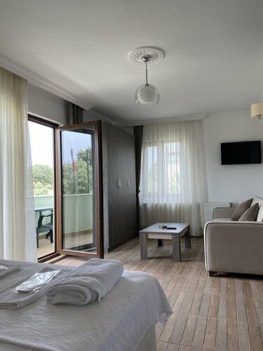 Gunes Yonu Otel, Забронировать Отель Гейикли Эгейский регион Турции