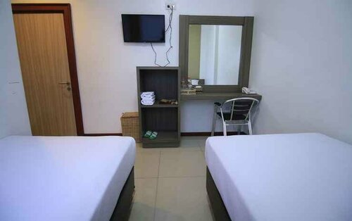 Zamrud Malioboro, Boek Hotel Danurejan 
