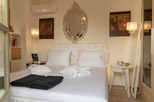 Faces Art Suites, Забронировать Гостевой дом Гостевые дома острова Родоса, рядом с Пляж Родоса, Гостевой дом