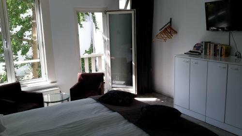 Bed & Breakfast WestViolet, Забронировать Отель Амстердам - центр города Амстердам, рядом с парк Вестерпарк
