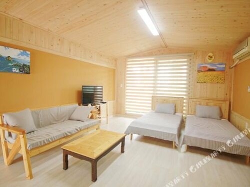Jeju Sunflower Pension, Забронировать Отель Pyoseon Согвипхо