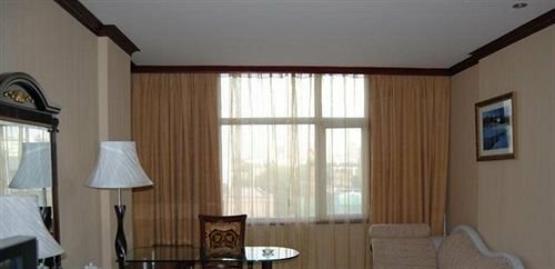 Tumalisi Hotel - Urumqi, Забронировать Отель Урумчи Синьцзян-Уйгурский автономный район, рядом с Большой базар