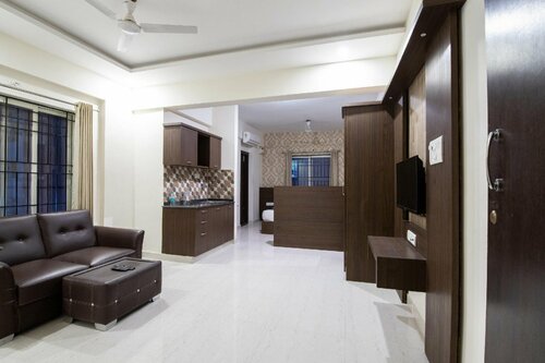 Capital O 9917 SJR Suites And Comforts, Забронировать Отель Отели Ялахалли с парковкой, Парковка