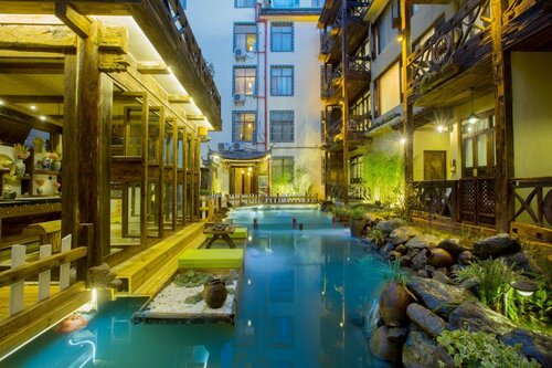 China Old Story Inn Lijiang Elite Garden, Забронировать Отель Отели Лицзян с завтраком, рядом с Baisui Bridge, Завтраки