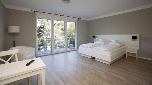 Hotel Am Römerwall, Забронировать Отель Оберштадт Майнц