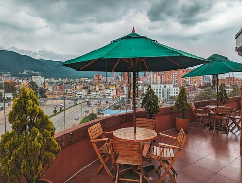 Hotel Charlotte Suite 26, Забронировать Отель Недорогие отели Богота, рядом с Американское посольство в Боготе, недорогие