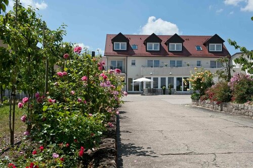Felshof - Weingut & Gästehaus, Забронировать Гостевой дом Зоммерхаузен Нижняя Франкония, рядом с Зоопарк Зоммерхаузена