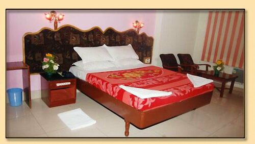 K & M International Business Hotel, Забронировать Отель Гунтур штат Андхра-Прадеш