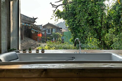 Lijiang Hotel JunPoXuan, Забронировать Отель Отели Лицзян с бассейном, рядом с Water Wheels, Бассейн