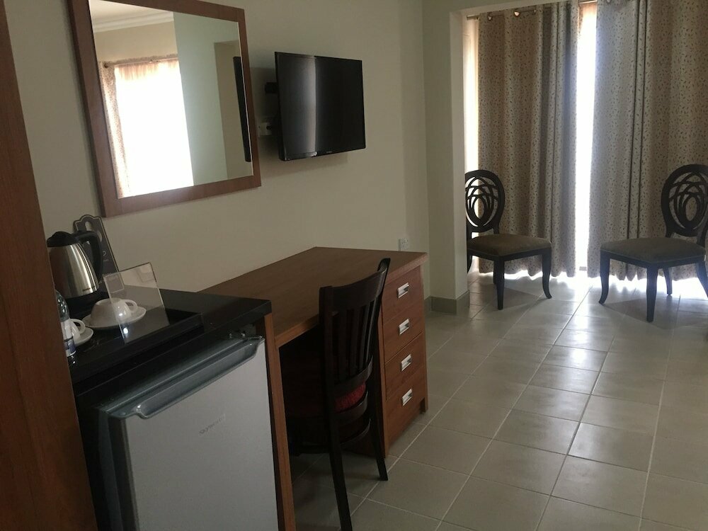 Cycad Palm Hotel