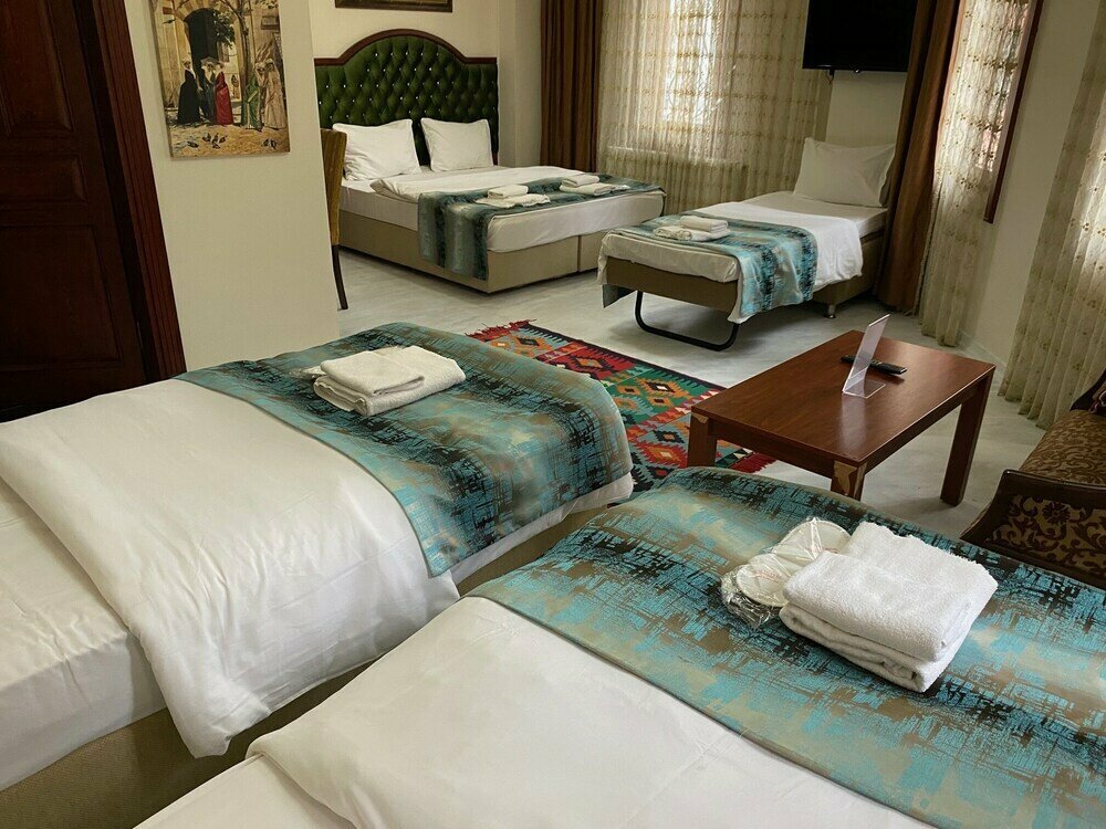 Atam Suites & Apart