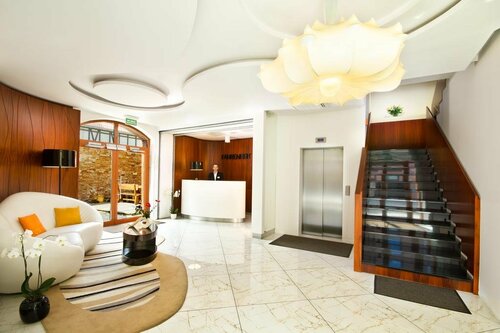 Hotel Fahrenheit, Забронировать Отель Отели в центре Гданьска, в центре, Завтраки