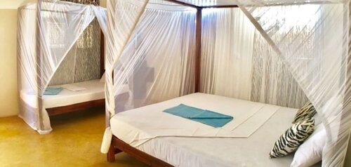 Msafini MangoTop Roof Hotel, Забронировать Отель Ламу Прибрежная провинция, рядом с Пляж Manda Beach