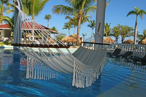 Cofresi Palm Beach & Spa Resort - All Inclusive, Забронировать Курортный отель Отели Сан-Фелипе-де-Пуэрто-Платы 4 звезды, рядом с Пляж Кофреси, 4*