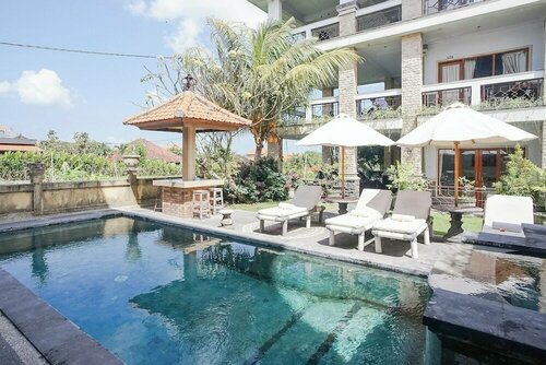 Agung Homestay Canggu Mitra RedDoorz, Забронировать Отель Недорогие отели провинции Бали, недорого