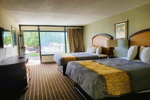 Palmetto Inn & Suites, Забронировать Отель Отели Оринджберг 3 звезды, рядом с Ботанический сад Эдисто, 3*