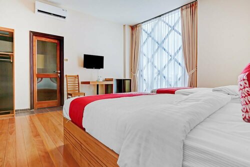 Oyo 90428 Remington Hostel, Забронировать Отель Палембанг Суматра