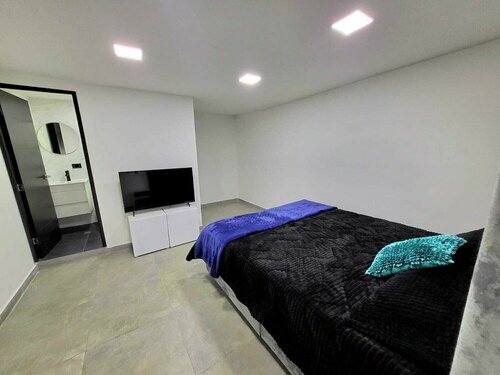 Hotel Hostal Caps Corferias, Забронировать Отель СПА-отели Богота, рядом с Конгресс-центр G12, SPA-услуги