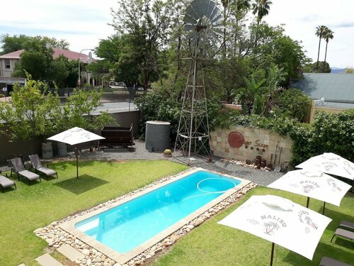 Karoo Sun Guest House, Забронировать Гостевой дом Гостевые дома Оудсхорн, рядом с Arbeidsgenot Museum, Гостевой дом